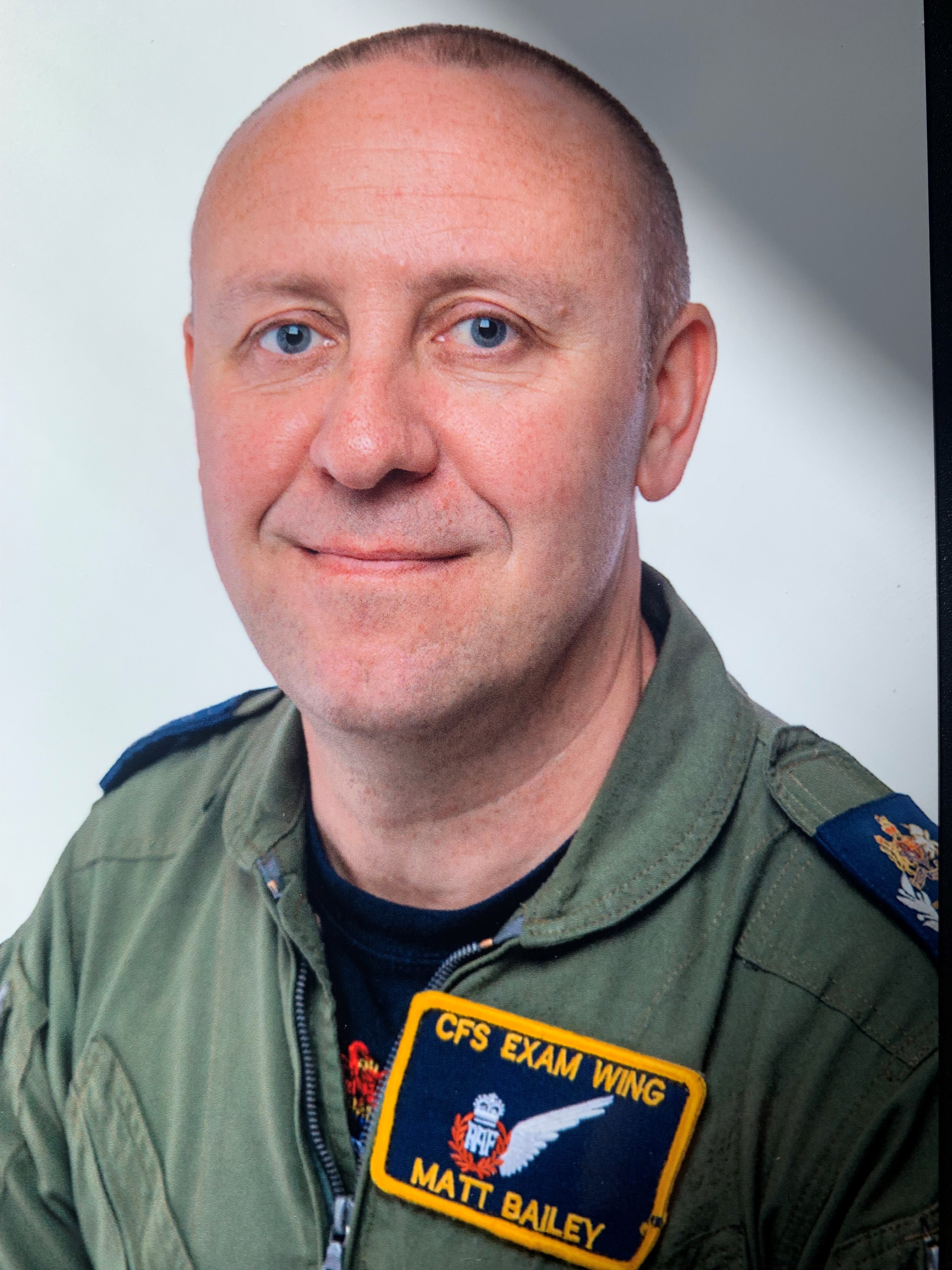 Image shows RAF aviator smiling.